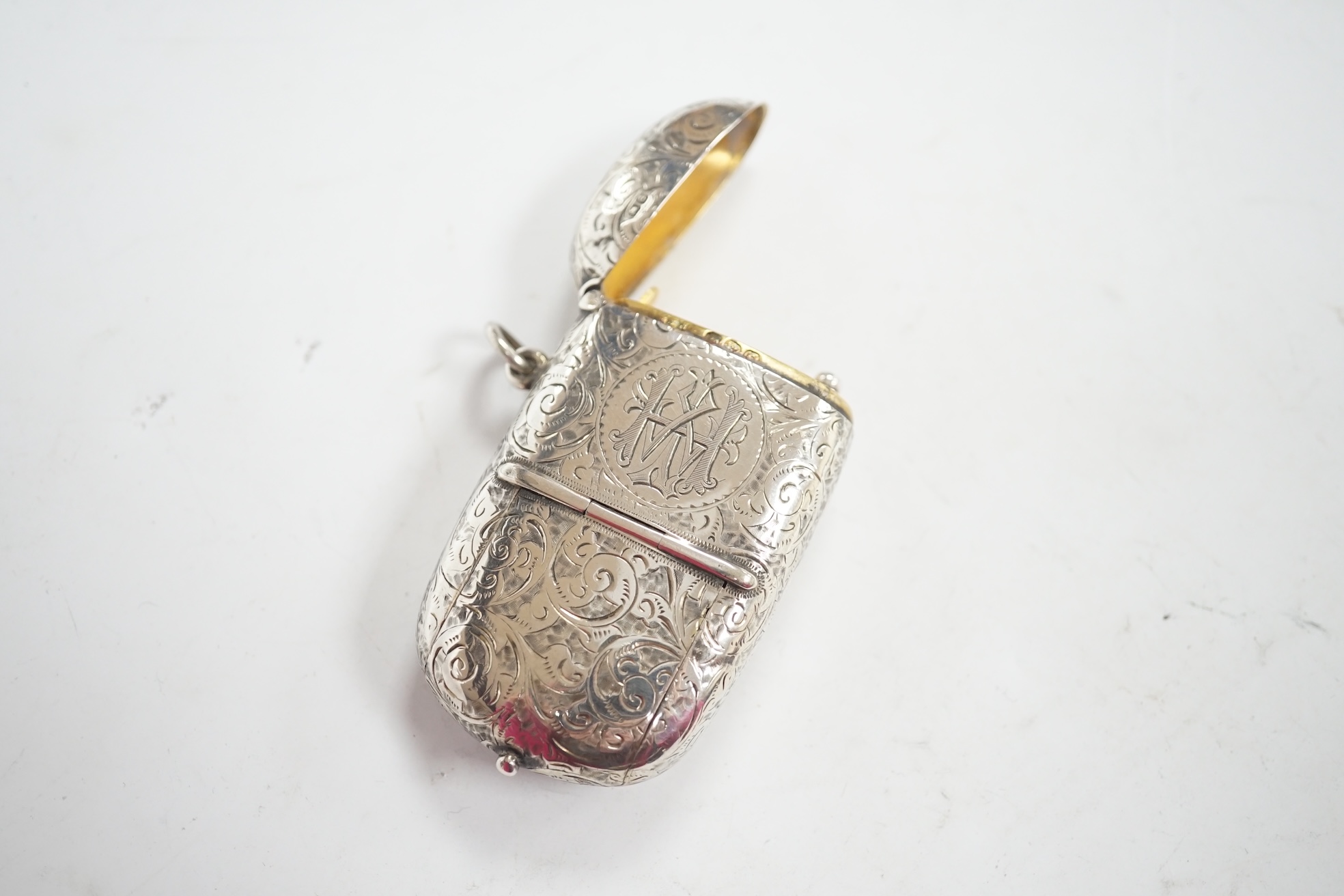 A late Victorian silver combination sovereign and vesta case, with pencil (lacking another item?, William Neale, Chester, 1890, 59mm. Condition - fair to good